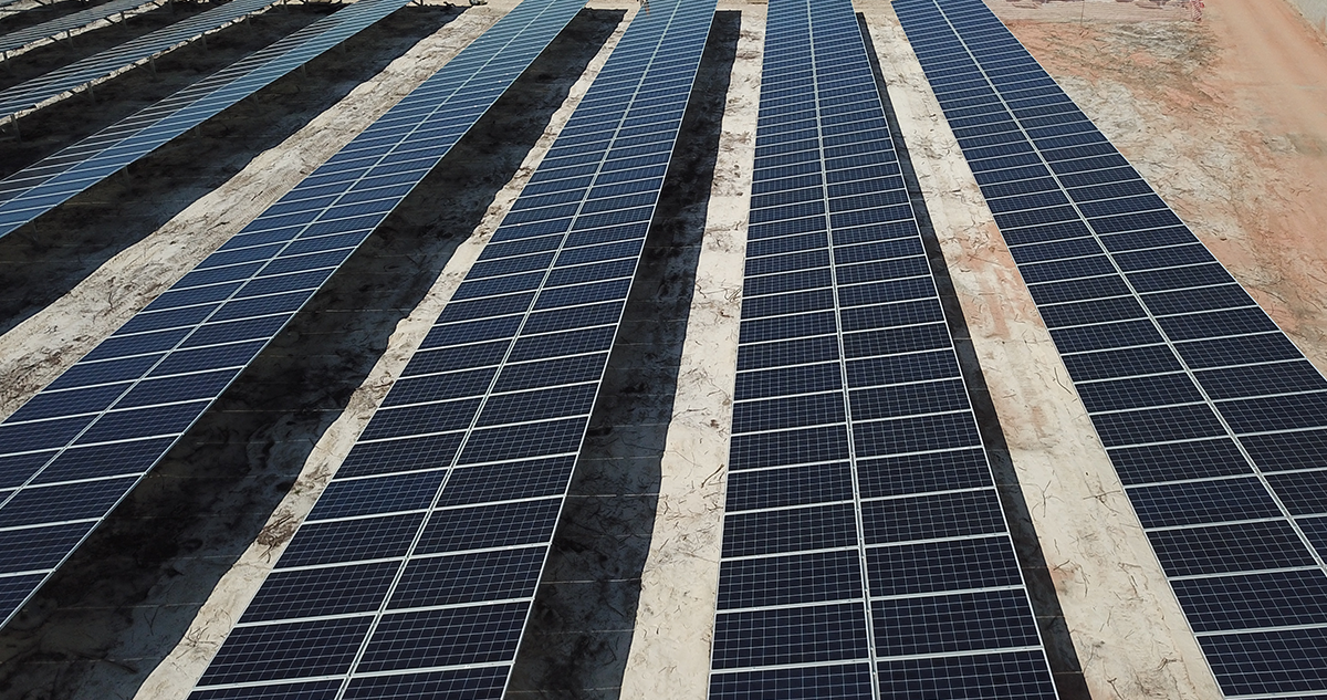 solar panels on dirt ground